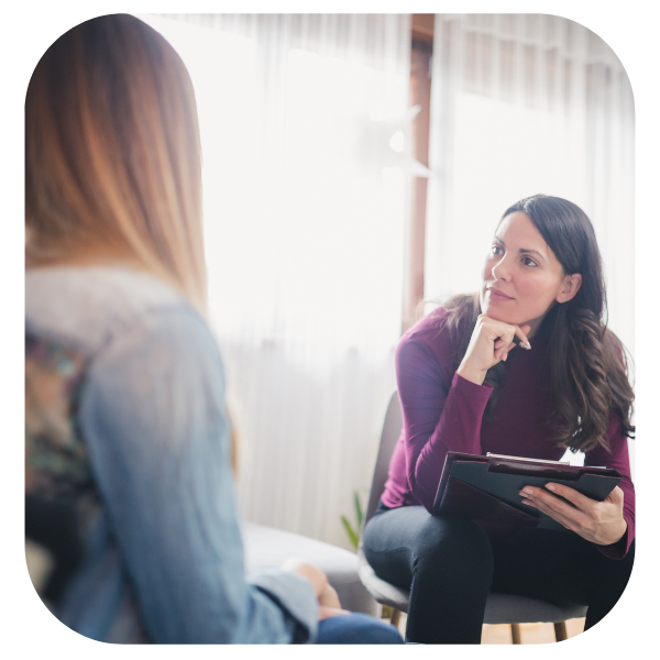 therapist listening to a client during session